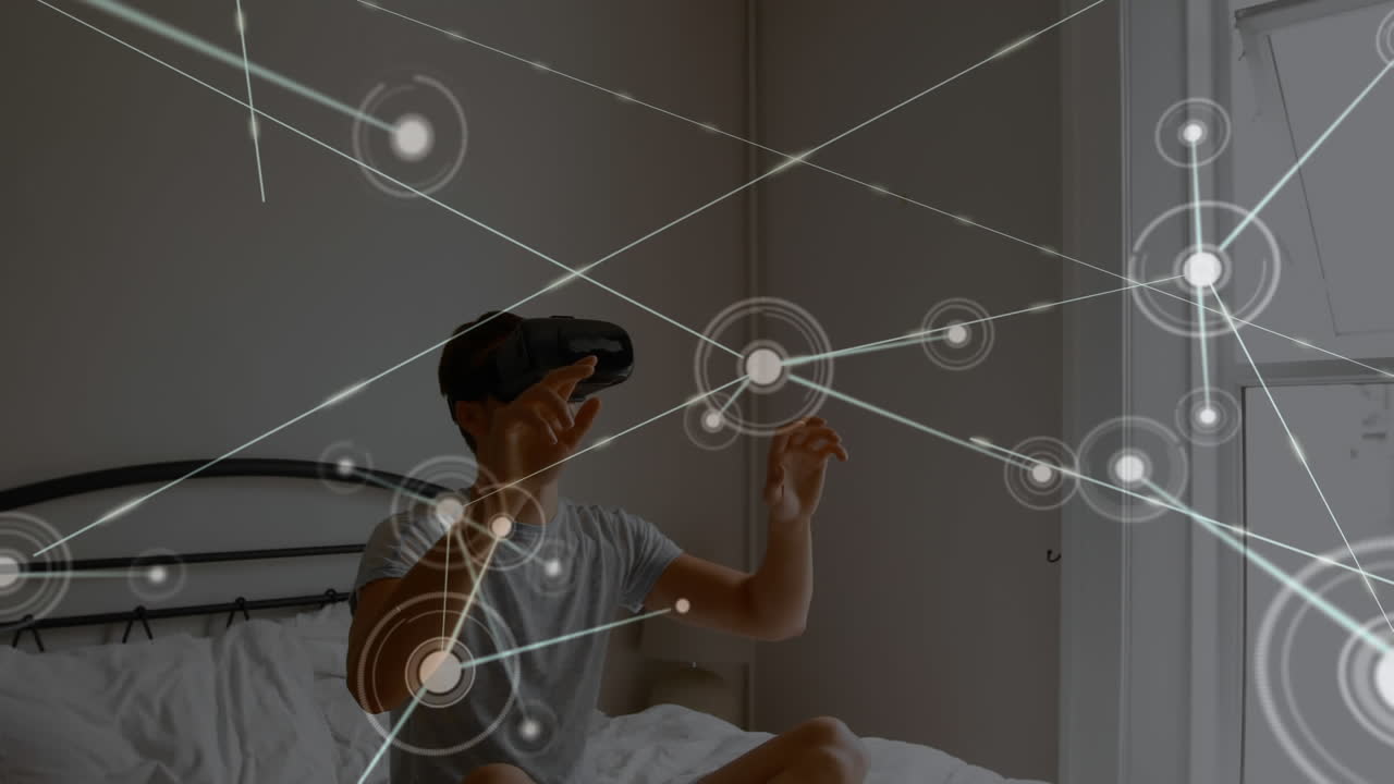 hombre sentado en la cama con un auricular de realidad virtual