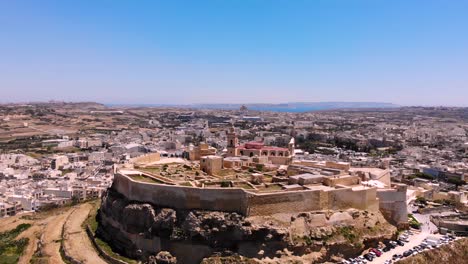 cittadella aerial drone pan shot, fly forward to medieval fortress, gozo, malta