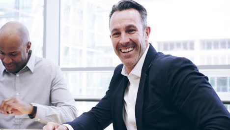 two mature business colleagues shaking hands