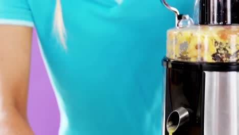 beautiful woman preparing smoothie