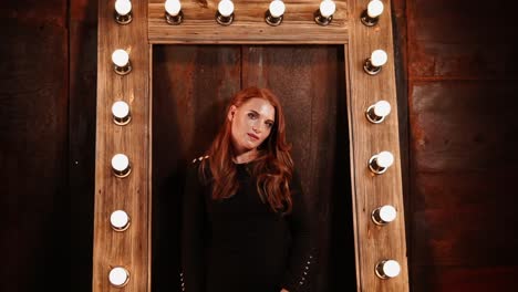 woman in a black dress, studio portrait