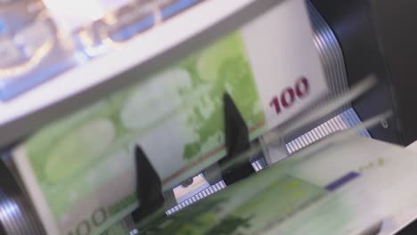 machine counter automatic calculates a large amount of euro banknotes in 4k slow motion 60fps