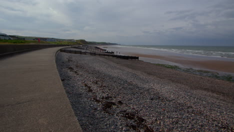 wide shot looking east of saint bees sea front at low tide, west lake district