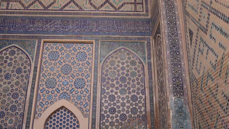 rugs for sale in a traditional market in samarkand, uzbekistan along the historic silk road