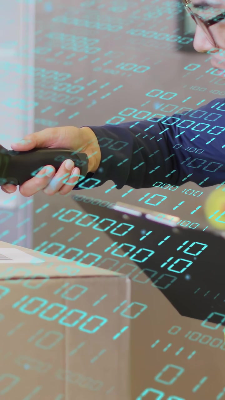 Vertical video: Shipper taking scanner scanning box, checking log with binary overlay for tracking