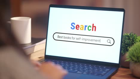 woman searching best books for self-improvement on internet