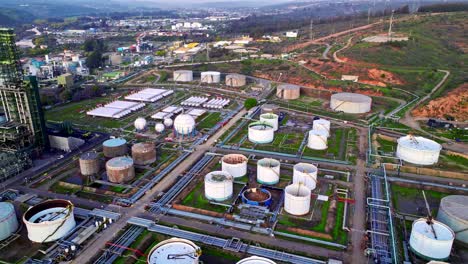 panoramic aerial orbit of storage tanks in the oil industry