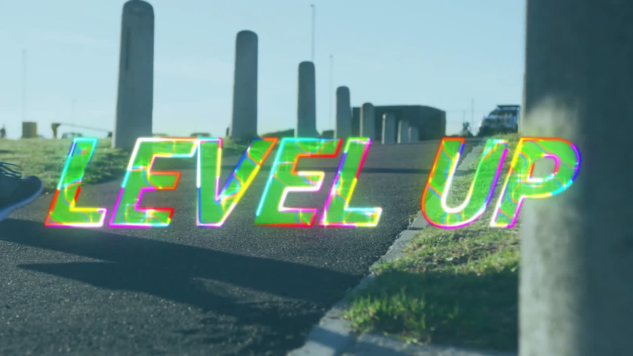 Level up text animation over pathway with poles and grass