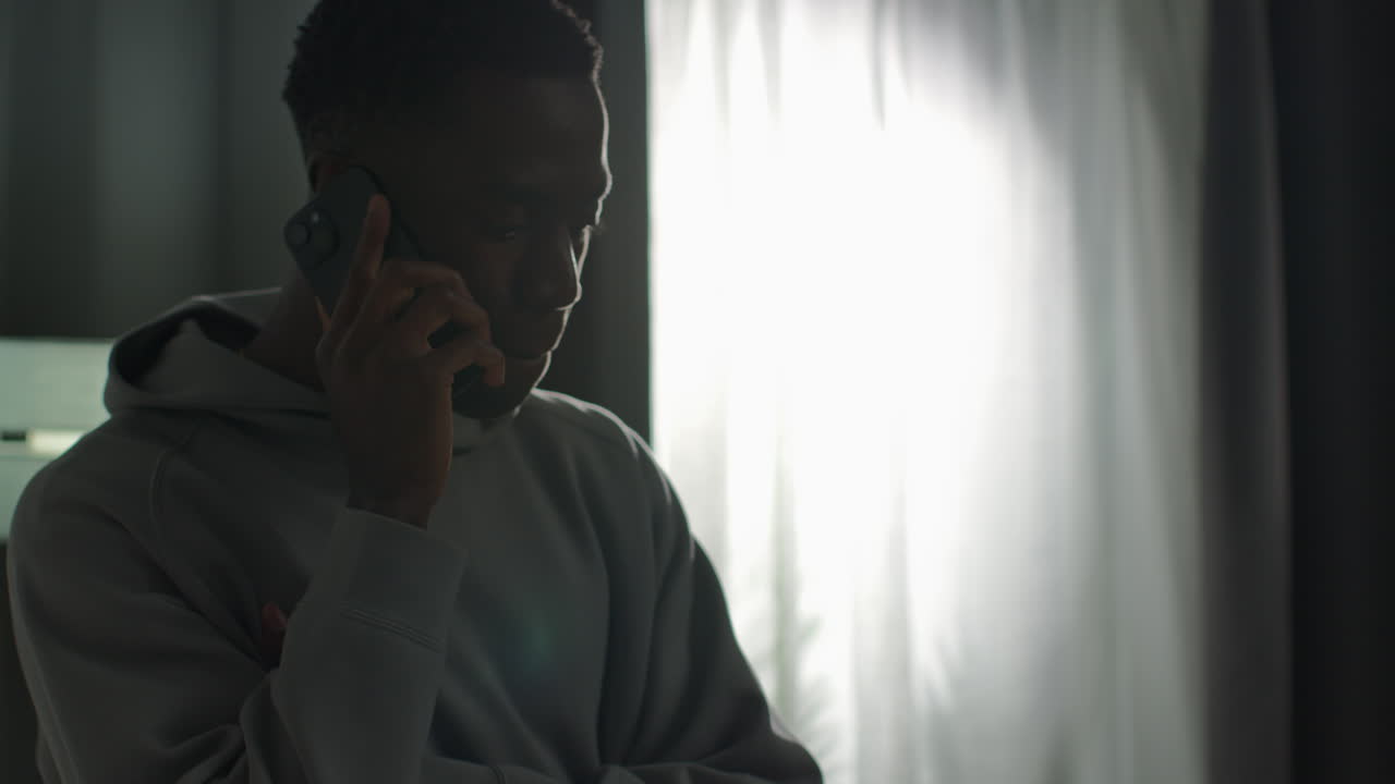 Free stock video - Close up of young man at home talking on mobile ...