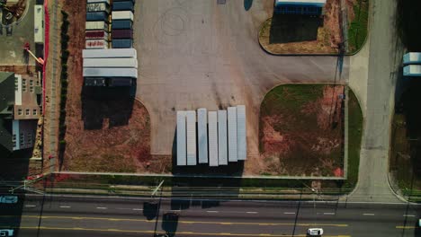 semi trailers and containers aligned in a parking lot in atlanta, georgia