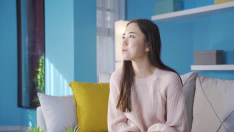 excited and happy asian young woman.