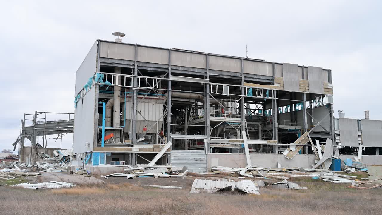The aftermath of a Russian missile strike on an industrial target near the frontline city of Kramatorsk. The factory building is left a gutted, skeletal ruin by the attack
