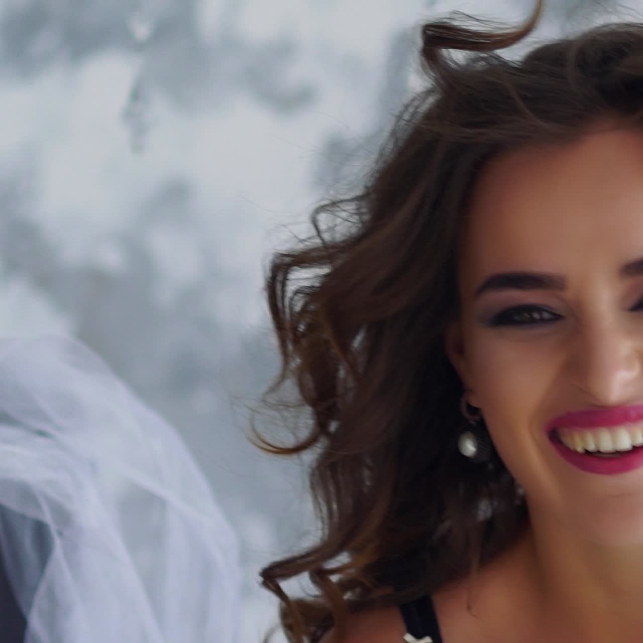 Attractive young woman flooring in the bedroom at home