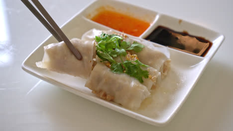 chinese steamed rice noodle rolls with crab - asian food style