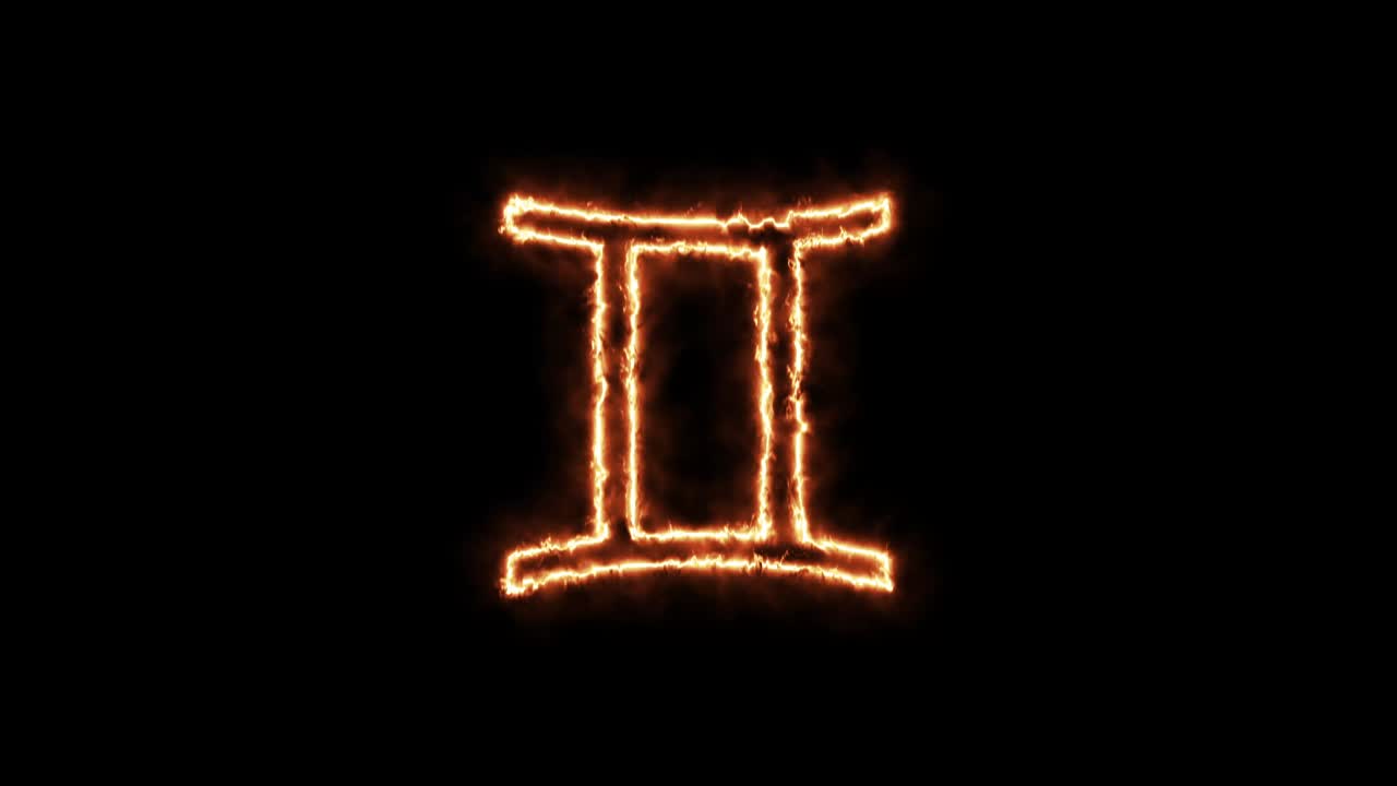 segni zodiacali gemelli in fiamme. animazione su sfondo nero lettere 4k video sta bruciando in una fiamma.