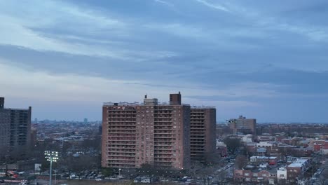 an aerial view over calvert vaux park in brooklyn, ny during a cloudy evening