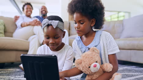 siblings, sisters or tablet with internet on floor