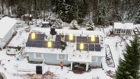 technician team installing sunlight collectors on a house with battery visualisation