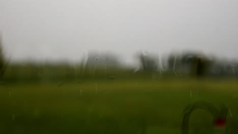rainfall sometimes heavy against a window, the splat of the drops against the glass, mesmerizing