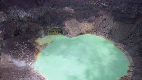 Aerial-view-of-steaming-jade-green-crater-lake-in-Santa-Ana-Volcano