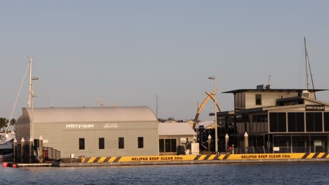 time-lapse of a ferry docking at a busy terminal