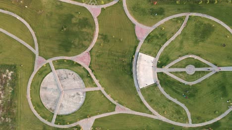 4k: drone flying over a public park in a modern housing society in the city of punjab, pakistan