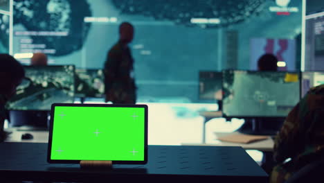 Tablet-with-greenscreen-display-running-in-a-command-post-base-of-operations