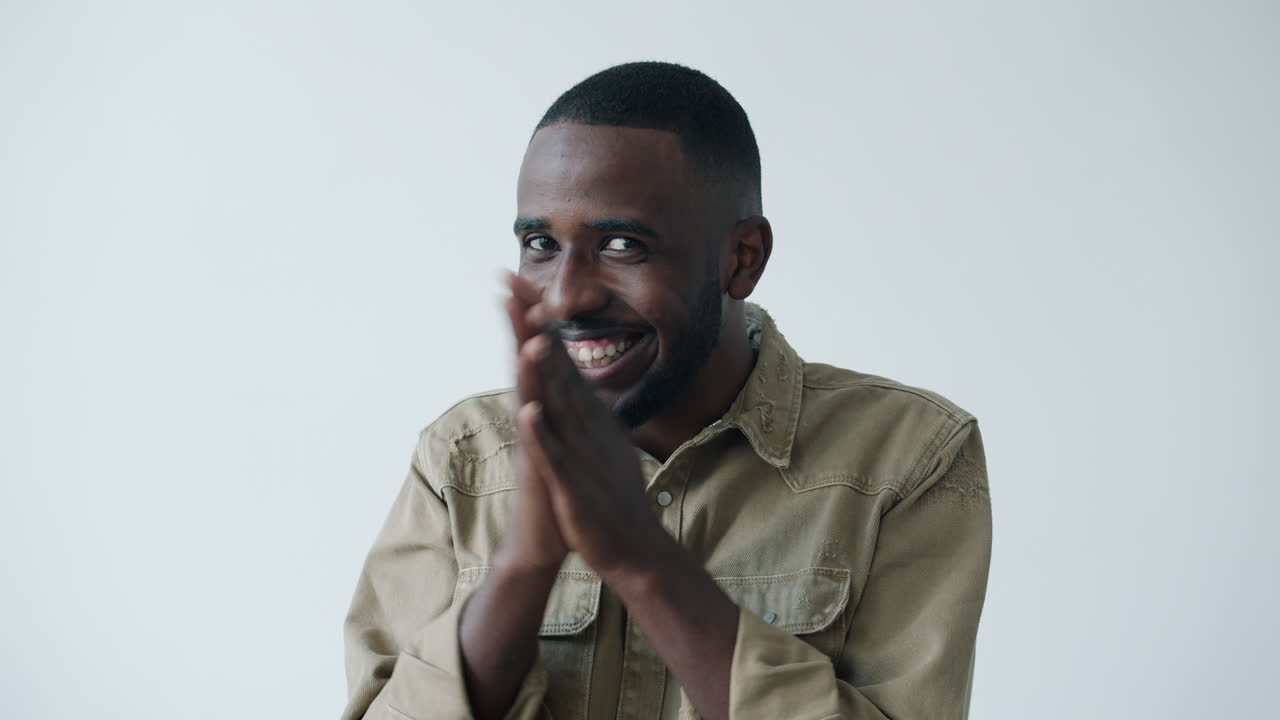 Smiling Man with Clapping Hands