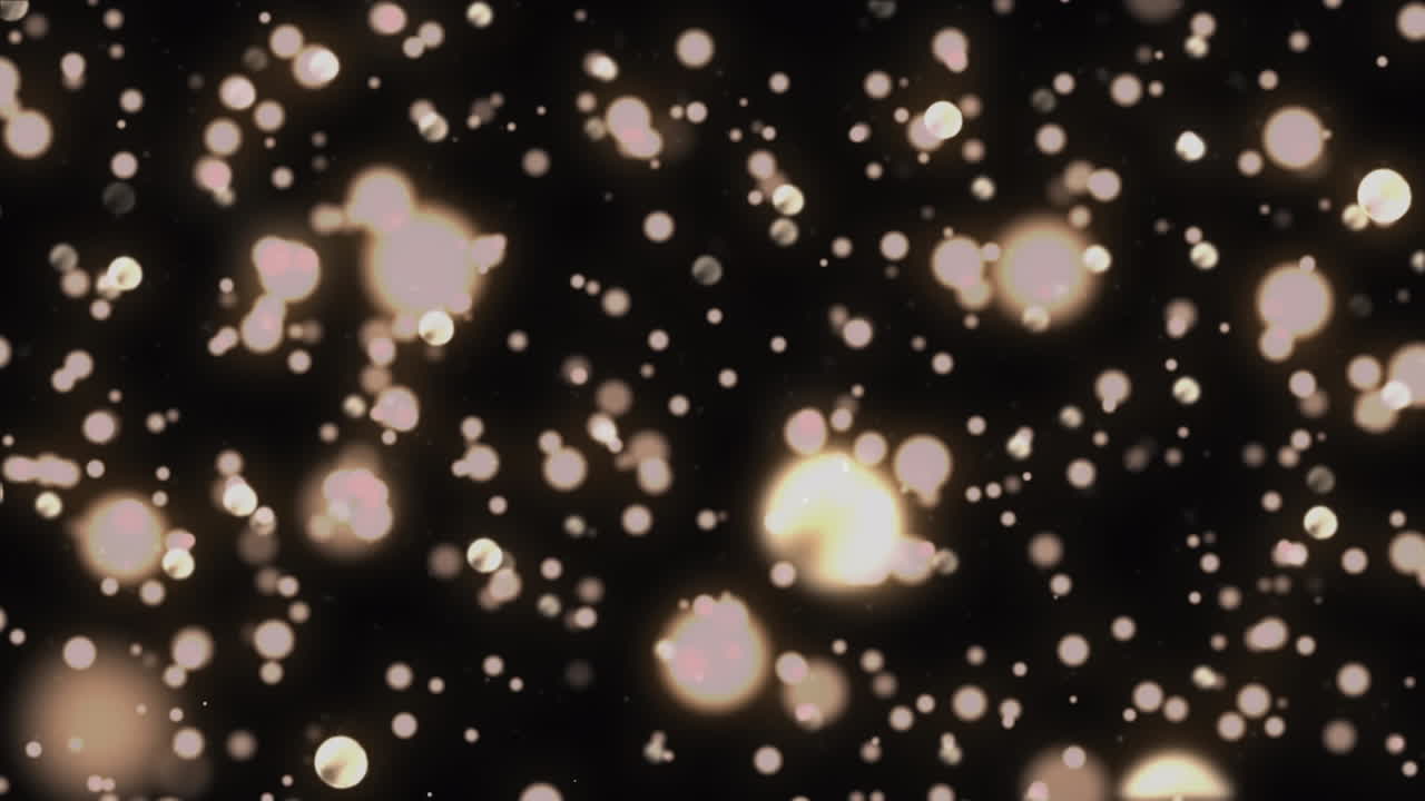 검은색 배경 위에 빛나는 노란색 반점의 애니메이션