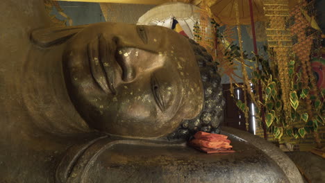 Giant-reclining-buddha-sculpture,-Close-up-shot