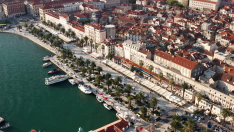 medieval town of split and riva boardwalk at the waterfront of adriatic sea in croatia