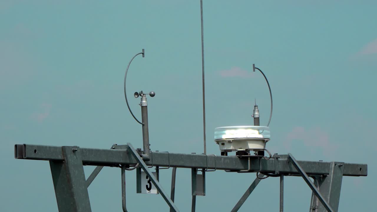 Close-up of a weather monitoring station with sensors and scientific equipment under a clear sky in Sátoraljaújhely, Zemplén Adventure Park, Hungary