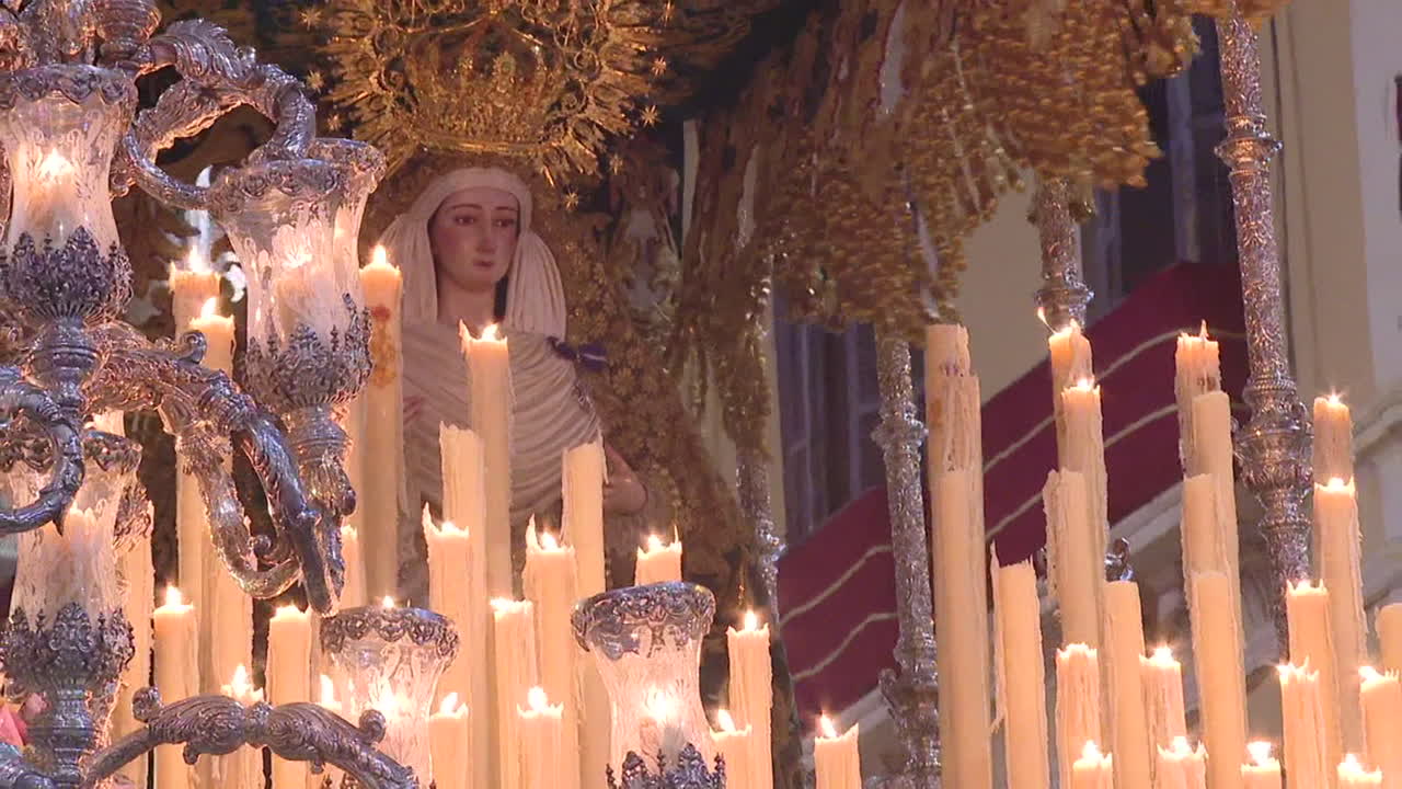 Religious Ceremony with Candles and Virgin Mary Statue