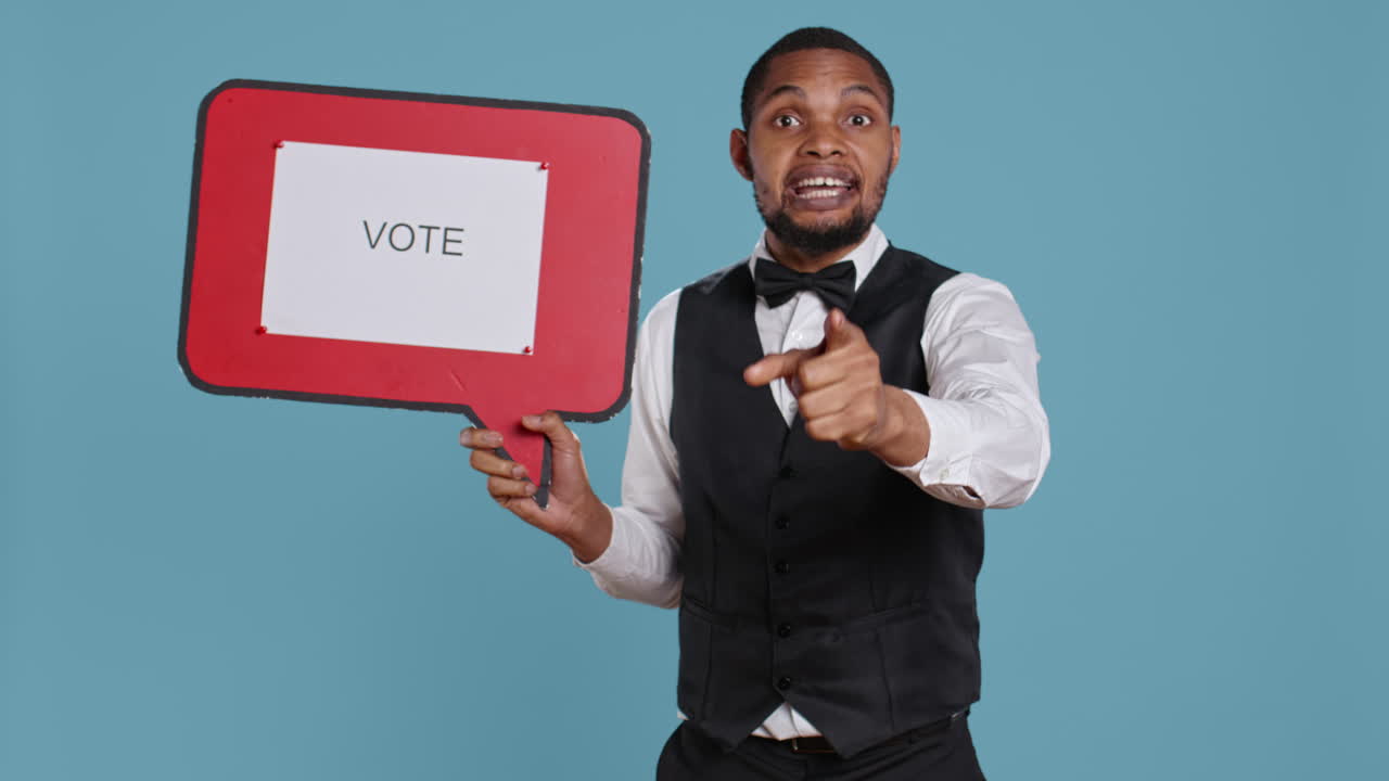 Political bellboy hotelier showing a speech bubble with the message to vote