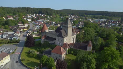 Smooth-aerial-top-view-flight-Austria-Heidenreichstein-castle-in-Europe,-summer-of-2023