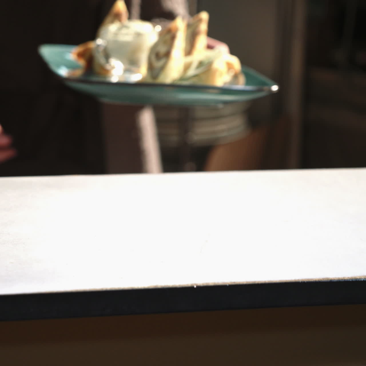 Professional chef at the restaurant serves pancakes with meat stuffing. Sqare video