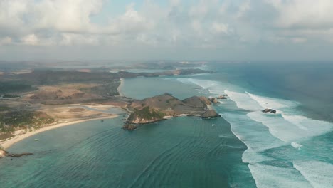 aerial of south lombok coast filled with blue water and tropical beaches