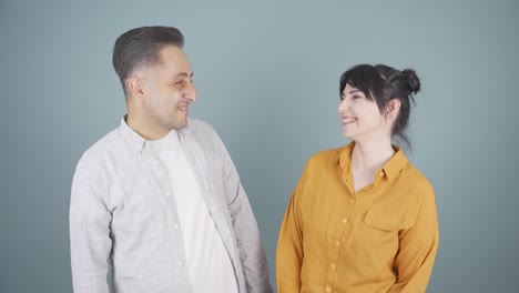 Couple-smiling-at-each-other.-Gestures.