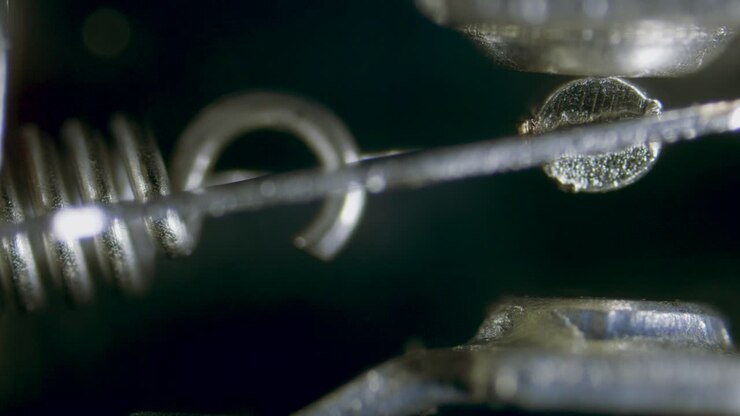 Endstop limit switch internal view in action under microscope