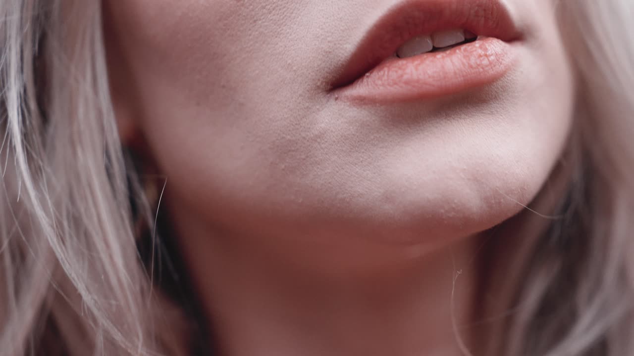 beautiful blonde woman, red lips and frensh nails