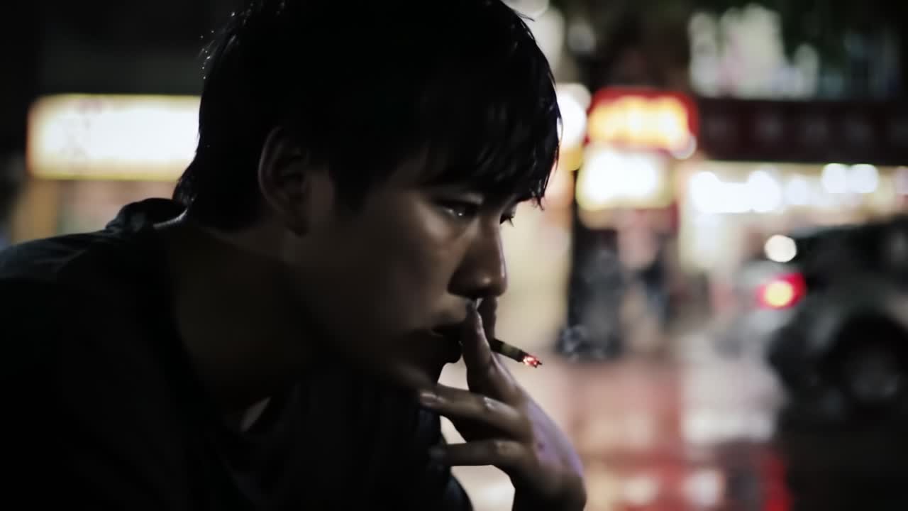 A Pensive Moment in the Rain: Capturing the Introspection of a Man Smoking Alone at Night in an Urban Setting, Reflecting on Life and Choices