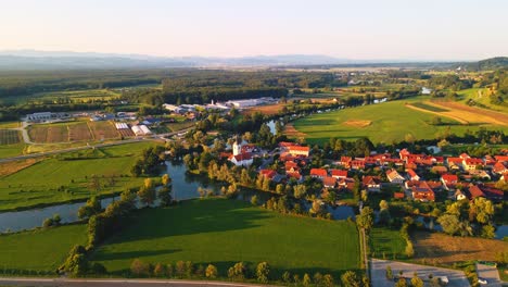 Stunning-aerial-4K-drone-footage-of-Kostanjevica-na-Krki-in-the-golden-sunset-light