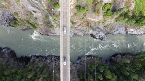 vertical top down view of hagwilget canyon bridge in northern british columbia on sunny day