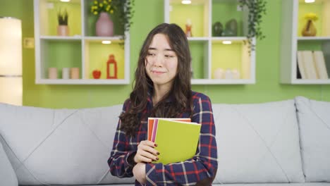 Unhappy-Asian-schoolgirl.