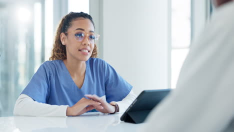 Doctor,-laptop-and-client-consultation-with-woman