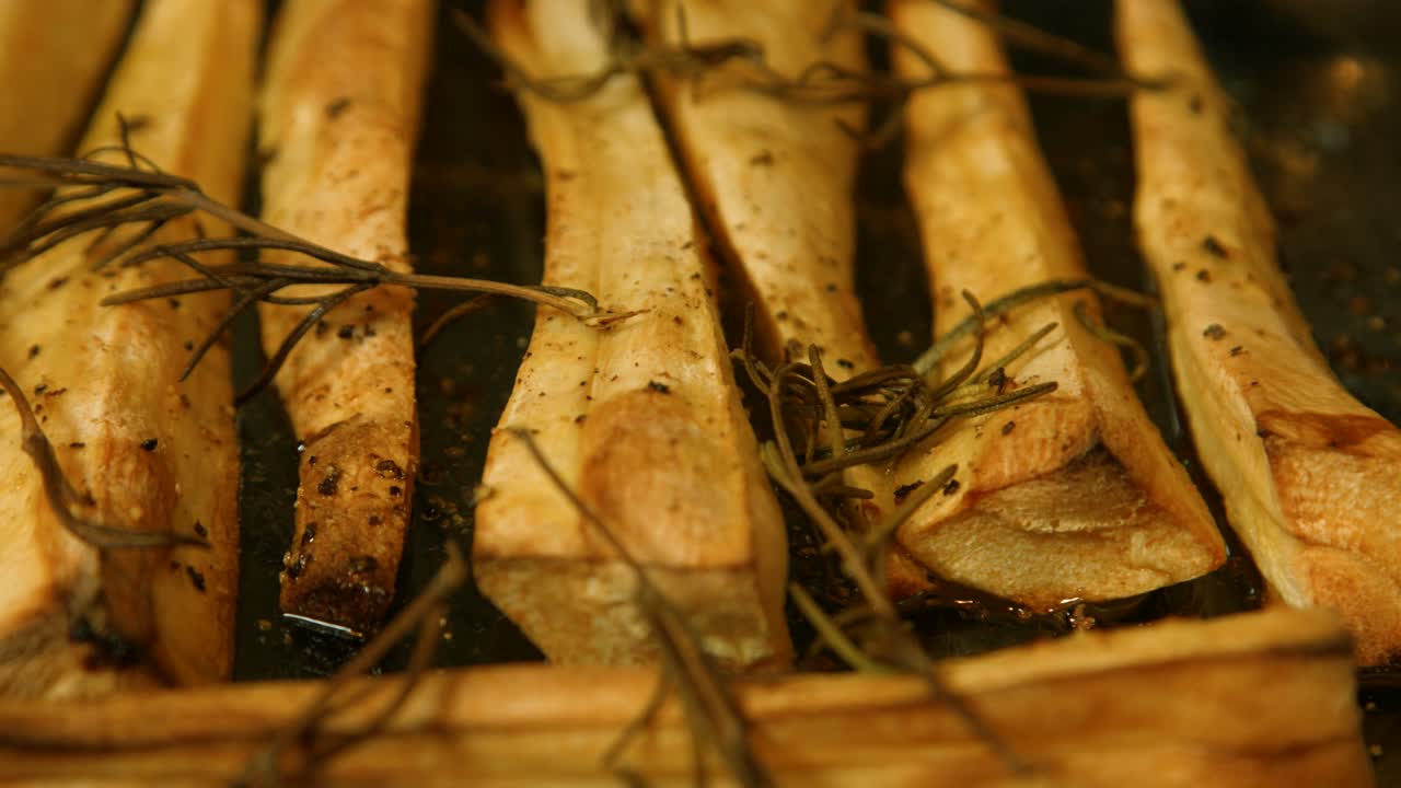 Cooked Roast Parsnips with Pepper and Rosemary