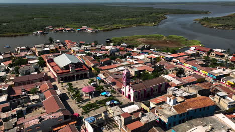 Aerial-view-over-the-Parroquia-de-San-Pedro-y-San-Pablo-in-Mexcaltitan,-Mexico