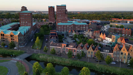 golden hour with modern buildings at amersfoort vathorst, the netherlands