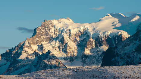 Sunset-Timelapse-Across-Side-Of-Snow-Capped-Cerro-Paine-Grande