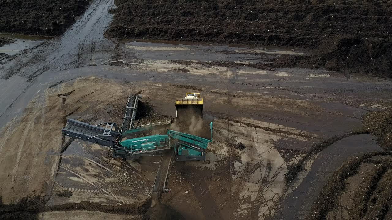 Bulldozer doing work aerial drone